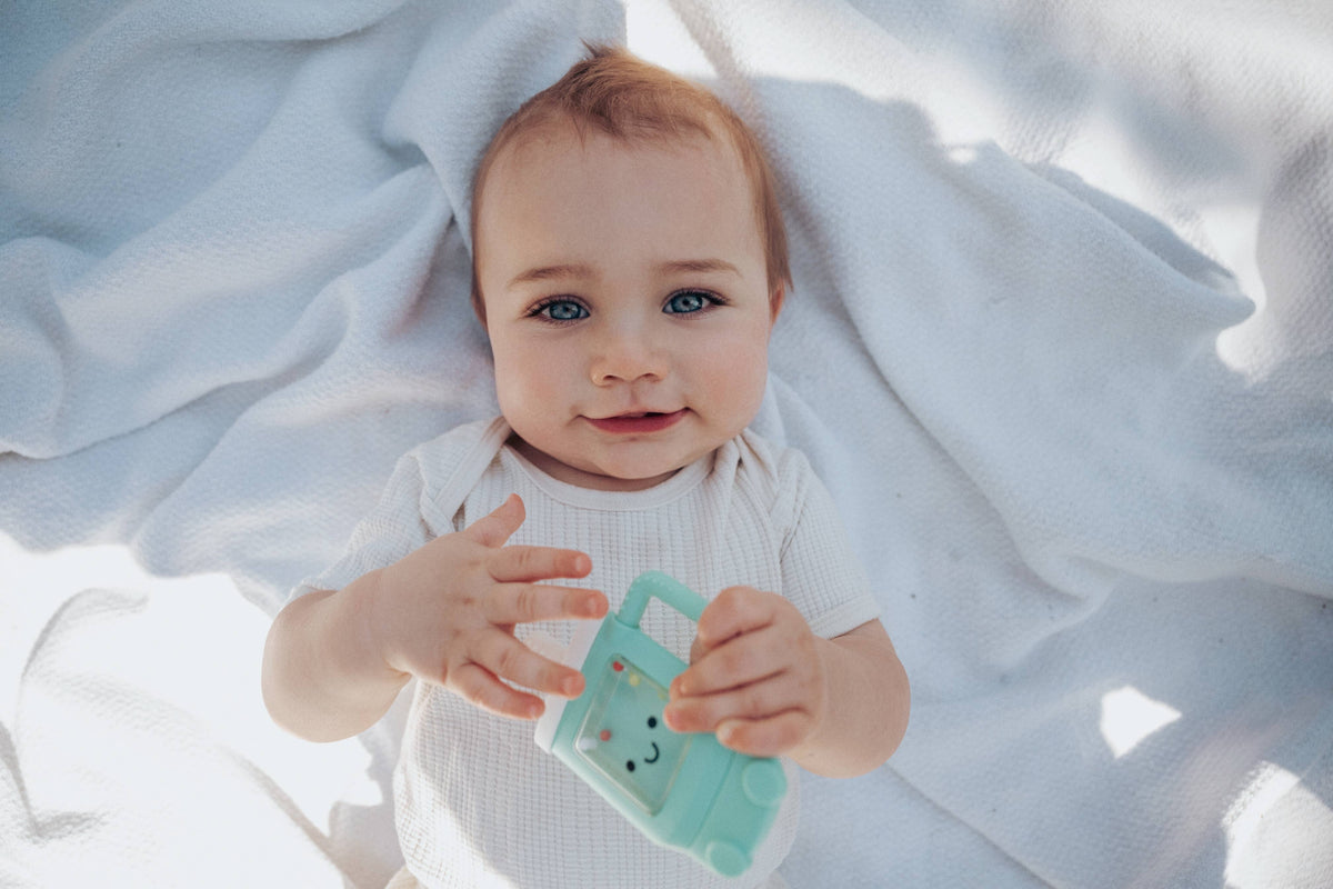 Sweetie Shake Plus™ - Teething + Rattle Toy